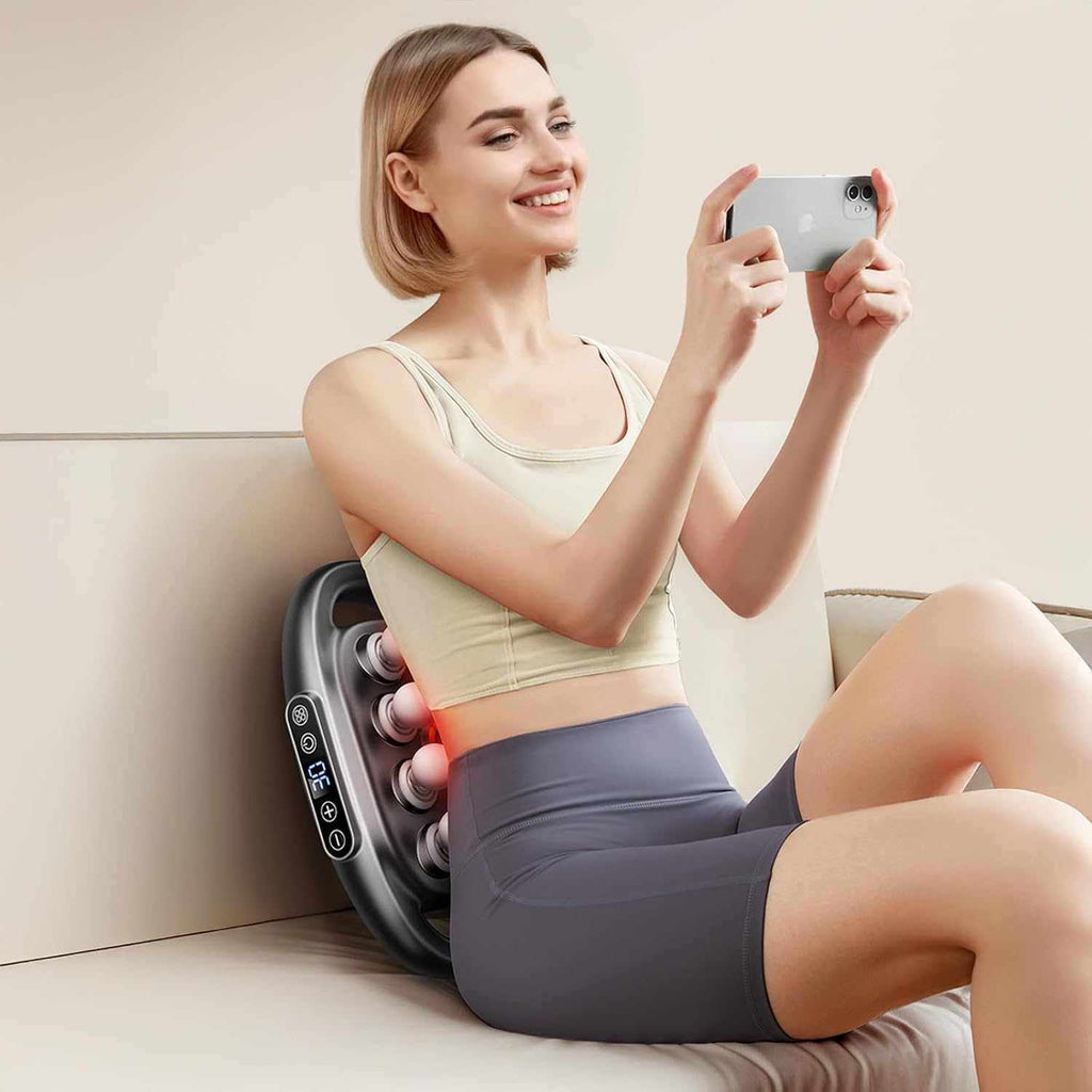 16 head massage gun with a dark gray plastic body, paired handles and a broad array of rounded massage heads