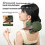Woman using a green and brown 4D humanoid hand massage device on her neck and shoulders.