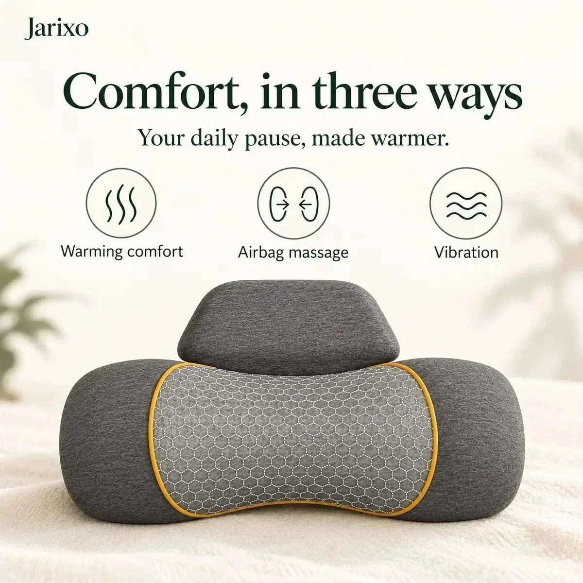 neck massager pillow in dark grey fabric with a honeycomb-patterned centre panel, orange trim and raised headrest