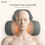Neck massager pillow in dark grey fabric with yellow piping and glowing honeycomb-patterned warming panels beside a headrest